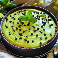 Gathering the right ingredients is key to making a delicious no-bake mint chocolate chip cheesecake. Here’s what you will need: - 1 ½ cups chocolate cookie crumbs (like Oreos or chocolate graham crackers) - ½ cup unsalted butter, melted - 16 oz cream cheese, softened - 1 cup powdered sugar - 1 teaspoon vanilla extract - 1 teaspoon peppermint extract - 1 cup heavy whipping cream - ½ cup mini chocolate chips - Green food coloring (optional, for a minty hue) - Fresh mint leaves for garnish (optional) Each ingredient plays a role in making this dessert creamy, rich, and refreshing. The chocolate cookie crumbs serve as a tasty crust, while the cream cheese adds a smooth texture. The whipped cream lightens the filling, making it fluffy. The mini chocolate chips add delightful bursts of chocolate in every bite. Feel free to adjust the mint flavor with the peppermint extract to suit your taste. If you want a fun color, use green food coloring to enhance the minty look. Lastly, garnish with fresh mint leaves for a pop of color and extra freshness. First, grab a mixing bowl. Combine 1 ½ cups of chocolate cookie crumbs with ½ cup of melted unsalted butter. Stir until every crumb is coated. Next, take a 9-inch springform pan. Press the crumb mixture firmly into the bottom. Make sure it is even. This step is crucial for a good base. Place the crust in the freezer to set while you prepare the filling. In another large mixing bowl, beat 16 ounces of softened cream cheese with an electric mixer. Keep mixing until it is smooth and creamy. Gradually add in 1 cup of powdered sugar. Mix until it is fully combined. Then, add 1 teaspoon of vanilla extract and 1 teaspoon of peppermint extract. If you want a minty green hue, add a few drops of green food coloring. Mix until the color is even. Now, take another bowl for the heavy cream. Whip 1 cup of heavy whipping cream until stiff peaks form. This step gives your cheesecake a light texture. Gently fold the whipped cream into the cream cheese mixture using a spatula. Be careful not to deflate the whipped cream. Finally, fold in ½ cup of mini chocolate chips, saving a few for later. Pour the filling over the chilled crust. Use a spatula to smooth the top. Make sure it looks nice and even. Now, cover the cheesecake with plastic wrap. Refrigerate it for at least 4 hours, but overnight is best. This chilling time helps it set perfectly. To get the best texture, start with room temperature cream cheese. Cold cream cheese can make your mixture lumpy. Softening it helps you achieve a smooth blend. Leave it out for about an hour before use. Next, whip the heavy cream to stiff peaks. This step adds lightness to your cheesecake. When the cream forms stiff peaks, it holds its shape well. Use a clean bowl and beaters for best results. You can adjust the mint flavor by using different extracts. If you want a stronger mint taste, add a bit more peppermint extract. Start with small amounts and taste as you go. Food coloring is great for presentation. A couple of drops of green food coloring can give your cheesecake a minty hue. Mix it in after adding the extracts. This makes your dessert look as good as it tastes. For garnishes, fresh mint leaves and extra chocolate chips work well. They add color and flavor. You can sprinkle some mini chocolate chips on top for a fun touch. Pair your cheesecake with beverages like coffee or mint tea. The rich flavors of the cheesecake blend nicely with these drinks. Enjoying them together makes for a delightful dessert experience. {{image_2}} You can get creative with your crust. Here are some fun ideas: - Graham Crackers: Swap chocolate cookies for graham crackers. This gives a classic taste. - Gluten-Free Crust: Use gluten-free cookies. Almond flour mixed with butter also works well. Want to mix things up? Here are some flavor ideas: - Different Extracts: Try adding almond or vanilla extract. This adds depth to the taste. - Mix-Ins: Toss in chopped nuts or fresh fruits. They bring new textures and tastes. You can make the chocolate even richer. Here are some options: - Dark Chocolate Chips: Use dark chocolate chips for a bolder flavor. They pair great with mint. - Chocolate Ganache Topping: Drizzle ganache on top for an extra chocolate kick. It adds a fancy touch. These variations let you put a personal spin on your no-bake mint chocolate chip cheesecake. Enjoy experimenting! To keep your no-bake mint chocolate chip cheesecake fresh, refrigeration is key. First, cover the cheesecake tightly with plastic wrap or aluminum foil. This prevents it from absorbing other odors in the fridge. Ideally, you should store it in the fridge for up to five days. After that, the taste may change. Always check for any signs of spoilage before serving. If you want to save some for later, freezing is a great option. First, slice the cheesecake into portions for easy serving. Wrap each slice in plastic wrap, then place them in an airtight container. This helps keep them fresh. You can freeze the cheesecake for up to three months. When you’re ready to enjoy it, move a slice to the fridge. Let it thaw overnight for the best taste. Avoid microwaving, as this can change the texture. Enjoy your delicious treat! Yes, you can make this cheesecake ahead of time. I recommend making it the day before you plan to serve it. This allows the flavors to blend and the cheesecake to set well. It can last up to three days in the fridge. Just cover it tightly with plastic wrap. You can tell when the cheesecake is set by checking its firmness. The filling should feel firm to the touch but still slightly jiggle in the center. If it feels too soft, give it more time in the fridge. It usually takes at least four hours to set, but overnight is best. If you need a substitute for heavy whipping cream, use coconut cream or a dairy-free whipped topping. Both options will keep a similar texture. You can also use sour cream for a tangy flavor if you want something different. While a springform pan is ideal, you can use other pans. A regular pie pan works fine, but it may be hard to remove slices. A glass baking dish can also work, but it won’t have the same look. The springform pan helps give a clean edge and a nice presentation. This blog post covers how to make a delicious cheesecake with a chocolate cookie crust and a minty filling. You learned about the key ingredients and the step-by-step process. Remember, the right cream cheese can make your cheesecake smooth. Don't forget to add fun flavors or customize the look! Whether you serve it for a party or a quiet night, following these tips ensures tasty results. Enjoy your cheesecake adventure and impress your friends!