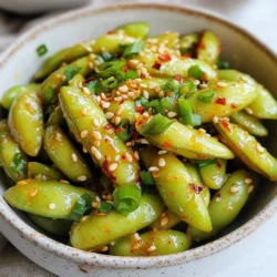 - 1 pound edamame pods - 4 cloves garlic - 2 tablespoons sesame oil - 1 tablespoon soy sauce - 1 teaspoon red pepper flakes - 1 tablespoon rice vinegar - Salt - 1 teaspoon toasted sesame seeds - 2 green onions - Servings: 4 - Prep Time: 10 minutes - Cook Time: 15 minutes You need simple ingredients to make spicy garlic edamame. First, you need edamame pods. You can use fresh or frozen. Both work well. Garlic gives a strong flavor that pairs well with edamame. Use four cloves for a nice kick. Then, you need sesame oil. This oil adds a nutty taste that makes the dish shine. You also need soy sauce for saltiness. A tablespoon will do. The red pepper flakes add heat. You can adjust this to your taste. If you want more spice, add more flakes. Lastly, rice vinegar adds a tangy touch that balances the flavors. For garnishes, you should use salt to taste. Toasted sesame seeds and green onions give a nice look and extra flavor. The sesame seeds add crunch, while green onions add freshness. This dish serves four. The prep takes only ten minutes, and cooking takes 15 minutes. You can enjoy this snack in no time! {{ingredient_image_1}} Cooking frozen edamame To cook frozen edamame, boil water in a pot. Add the frozen pods and cook for 3-5 minutes. They should be tender but firm. Drain the edamame and set them aside. Cooking fresh edamame If you have fresh edamame, steam or boil them for about 5-7 minutes. The pods should feel soft but not mushy. Drain them once cooked. Heating the sesame oil In a large skillet, pour in 2 tablespoons of sesame oil. Heat it over medium heat until it shimmers but does not smoke. Sautéing until fragrant Add 4 cloves of minced garlic to the hot oil. Sauté for 1-2 minutes. Stir often to prevent the garlic from burning. You want it fragrant and golden. Adding edamame to the skillet Next, add the cooked edamame to your skillet. This is where the fun begins, as the flavors start to come together! Mixing with sauce and spices Pour in 1 tablespoon of soy sauce, 1 teaspoon of red pepper flakes, and 1 tablespoon of rice vinegar. Toss everything together well. Cook for another 2-3 minutes. This allows the edamame to soak up all the yummy flavors. Adjusting seasoning to taste Finally, taste your mixture. Add salt if needed. You can also adjust the red pepper flakes for more heat. Enjoy the process of finding your perfect balance! To get the best taste in your spicy garlic edamame, you can adjust the spice level with red pepper flakes. Start with a teaspoon and add more if you want it hotter. A little goes a long way. Balancing the heat is key, so add rice vinegar and soy sauce. Rice vinegar adds a tangy kick that brightens the dish. Soy sauce gives it a savory depth that complements the garlic. Prevent garlic from burning by cooking it on medium heat. Garlic cooks fast, so stay close and stir often. If garlic burns, it will taste bitter, which is not what you want. Ensuring your edamame is tender is also important. If you’re using frozen edamame, boil it for 3-5 minutes. For fresh edamame, steam it for about 5-7 minutes. Tender beans are a must for great texture. Serving your edamame in rustic bowls makes it look more inviting. It adds a homey touch that people love. Use toothpicks for easy eating. This also makes it fun to snack on. Garnishing effectively can elevate the dish. A sprinkle of toasted sesame seeds and green onions adds color and crunch. Pro Tips Perfectly Cooked Edamame: Ensure the edamame is tender but not mushy by testing for doneness a minute before the recommended cooking time. Adjusting Spice Levels: Start with a small amount of red pepper flakes and gradually add more to achieve your preferred heat without overwhelming the dish. Fresh Garlic Flavor: For a stronger garlic flavor, add a few slices of raw garlic just before serving as a garnish. Presentation Matters: Use a colorful serving bowl and arrange the garnishes artfully to enhance the visual appeal of your dish. {{image_2}} You can easily spice up your edamame. Try adding chili oil for a rich flavor. Fresh chili peppers also work well. Just chop them finely and toss them in. Start with a small amount. You can always add more if you like it hot! Let’s talk about flavor. Adding lime juice or zest gives a fresh taste. Squeeze a bit right before serving. You can also mix in different spices. Try adding cumin or paprika for a twist. Each spice brings a new layer of flavor. If you need a gluten-free option, swap soy sauce for tamari. It tastes just as good! This simple change keeps the dish safe for everyone. You don’t have to miss out on the fun. Enjoy your spicy garlic edamame with confidence! To keep your spicy garlic edamame fresh, place it in an airtight container. This helps maintain flavor and texture. Store the container in the fridge. The leftovers will last for about 3 to 4 days. If you want to enjoy them later, proper storage is key. When you are ready to eat your leftovers, reheating is simple. The best way is to use a skillet. Heat it on medium and add the edamame. Stir it for a few minutes until warm. This method keeps the flavor and texture intact. You can also use a microwave. Just cover the bowl with a damp paper towel. Heat it for 30 seconds, stir, and repeat if needed. If you want to save your edamame for later, freezing works well. Spread the cooked edamame on a baking sheet. Freeze until solid, then transfer to a freezer bag. This keeps them fresh for up to 3 months. When you're ready to use them, thaw in the fridge overnight. Alternatively, you can microwave them straight from the freezer. Cook for a couple of minutes, check, and stir. Enjoy your edamame later without losing the great taste! Edamame are young soybeans. They grow in pods and are often green. You can eat them as a snack or side dish. Edamame is packed with protein, fiber, and vitamins. They are low in calories and high in nutrients. This makes them a great choice for healthy eating. Nutritional benefits of edamame: - High in protein - Rich in fiber - Contains vitamins A, C, and K - Good source of iron and calcium - Low in fat Yes, you can use frozen edamame. Frozen edamame is often just as good as fresh. It saves you time because it is prepped and ready to cook. You can find it in most grocery stores. Tips for cooking frozen edamame: - Boil water and add the frozen pods. - Cook for 3-5 minutes until tender. - Drain and set them aside before adding to the pan. Making this recipe vegan is easy. You just need to swap a few ingredients. Substituting ingredients for vegan-friendly options: - Use tamari instead of soy sauce for a gluten-free option. - Check that your sesame oil is pure and vegan. - Skip any non-vegan garnishes, like dairy products. These changes keep the dish tasty and plant-based. Enjoy your spicy garlic edamame! This blog post explored a simple edamame recipe full of flavor. We discussed key ingredients like garlic and sesame oil, and highlighted easy steps to prepare it. I shared tips to enhance flavor and presentation ideas to impress guests. You can adjust spices or make it gluten-free, ensuring everyone enjoys. Finally, I included storage tips so your leftovers stay fresh. Enjoy making this tasty dish and experimenting with your own twists!