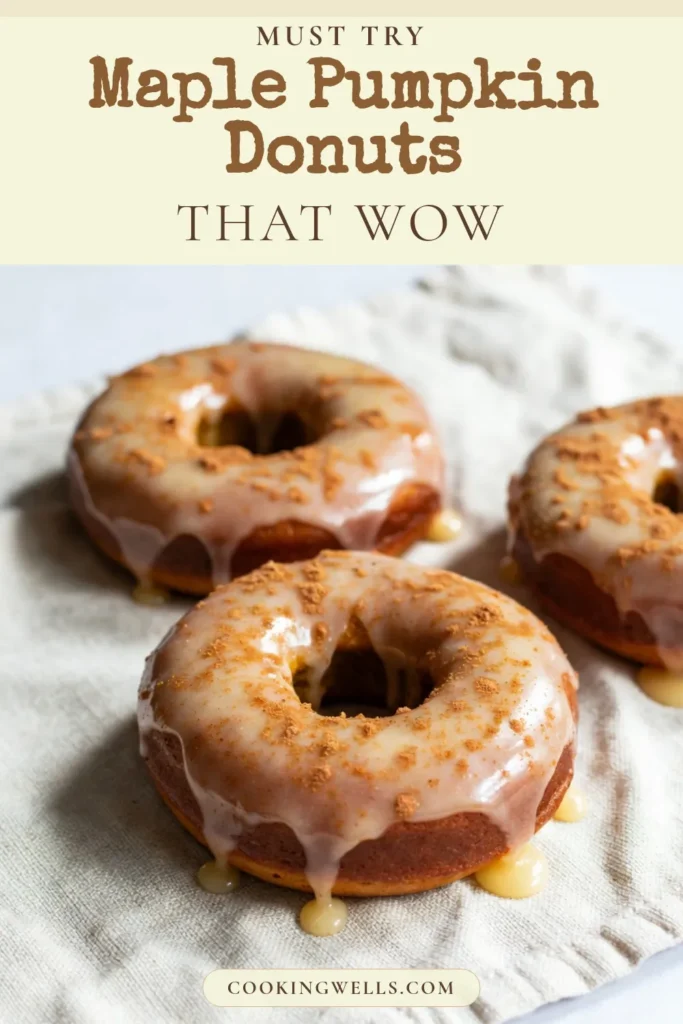Indulge in these delicious homemade maple pumpkin donuts that are sure to become a fall favorite! These baked pumpkin donuts are not only healthier but are also perfect for satisfying your pumpkin spice cravings. This easy maple glaze recipe adds the perfect sweet finishing touch. Try making these pumpkin spice donuts today and enjoy them warm! Save this recipe for your next cozy baking session! #MaplePumpkinDonuts #BakedPumpkinDonuts #PumpkinSpiceDonuts #HomemadeDonutsRecipe